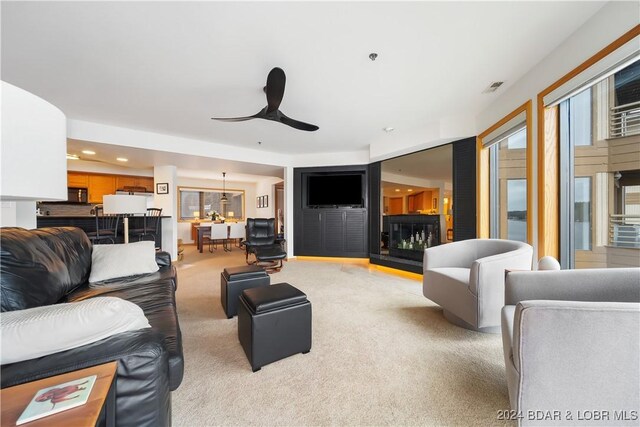 701 Cedar Rd Unit 1B, Lake Ozark, MO 65049 - living room featuring visible vents, a ceiling fan, recessed lighting, and light colored carpet