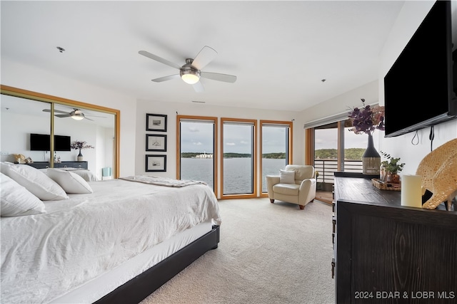 bedroom featuring ceiling fan, carpet flooring, and access to exterior