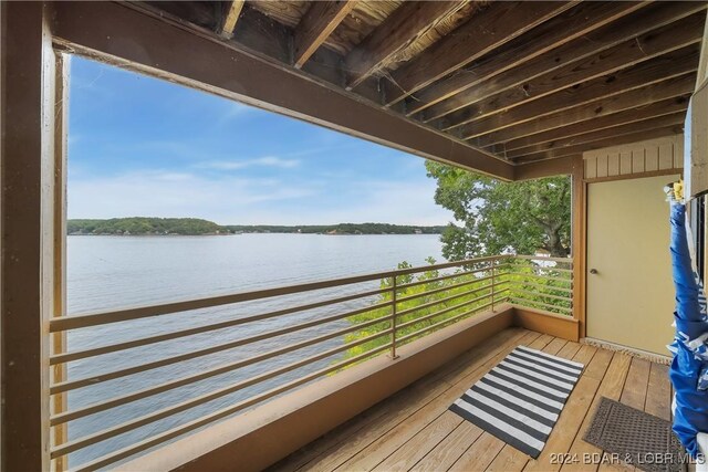 701 Cedar Rd Unit 1B, Lake Ozark, MO 65049 - balcony featuring a water view