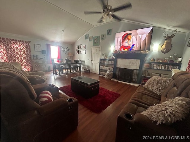 living room featuring ceiling fan, a high end fireplace, wood-type flooring, and vaulted ceiling