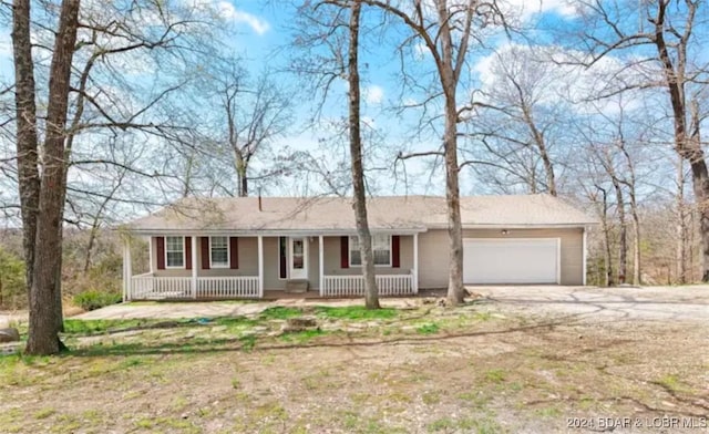 single story home featuring a garage