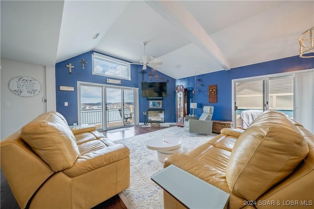 166 Falls Point Dr Unit 2B, Lake Ozark, MO 65049 - living room featuring ceiling fan, a glass covered fireplace, high vaulted ceiling, and wood finished floors