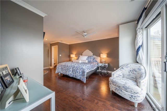 bedroom featuring ornamental molding, ceiling fan, and dark wood-type flooring