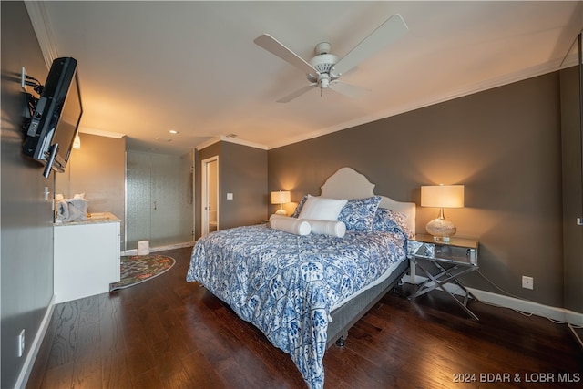 bedroom with ceiling fan, dark hardwood / wood-style floors, and crown molding