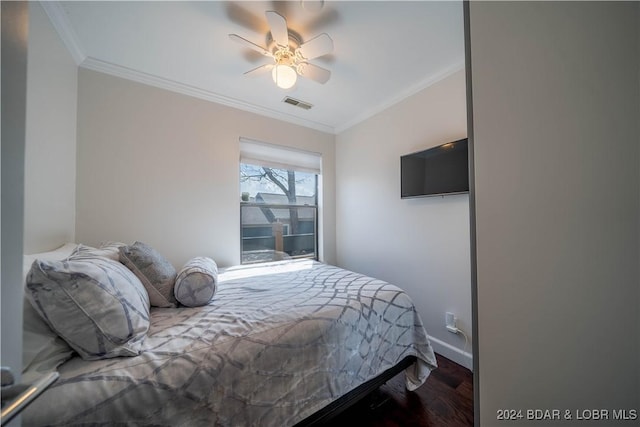 166 Falls Point Dr Unit 2B, Lake Ozark, MO 65049 - bedroom with wood finished floors, ornamental molding, a ceiling fan, and baseboards