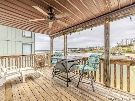 wooden deck with ceiling fan