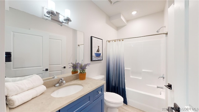 full bathroom featuring shower / tub combo, vanity, and toilet