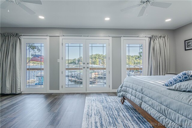 bedroom with wood-type flooring, ceiling fan, and access to exterior