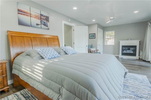 bedroom featuring ceiling fan and hardwood / wood-style floors