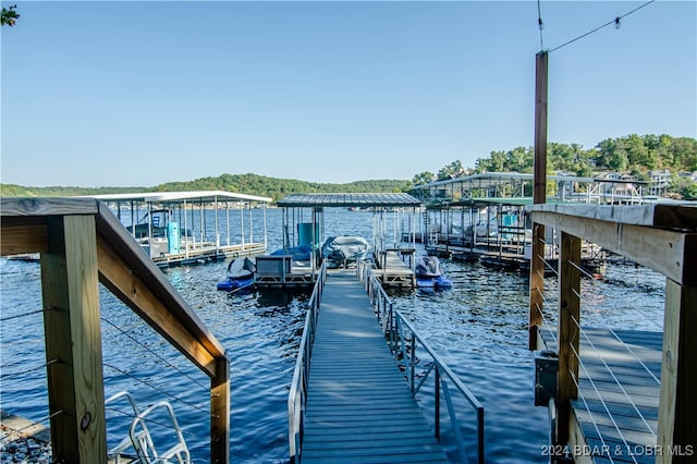 view of dock with a water view