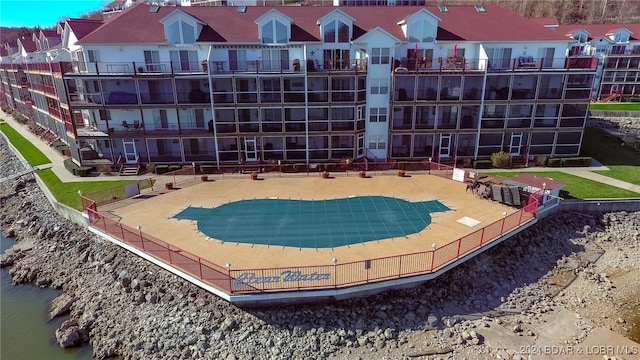 view of swimming pool featuring a patio area