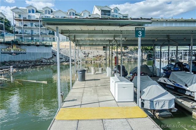 view of dock with a water view