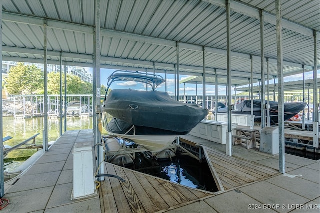 view of dock with a water view