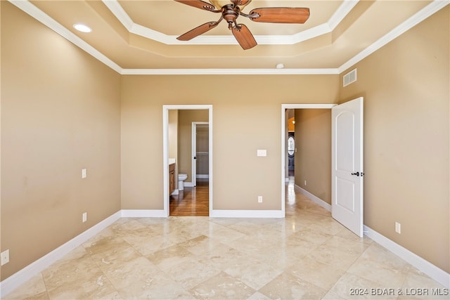 unfurnished bedroom with ceiling fan and crown molding