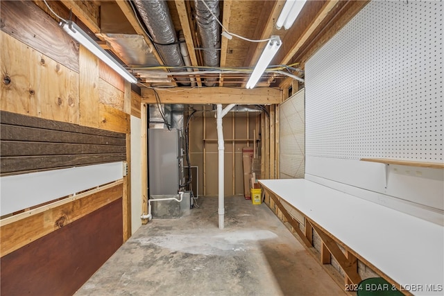 basement featuring heating unit