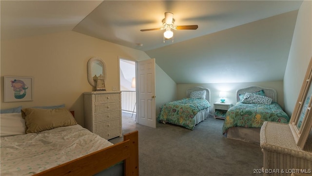 bedroom featuring lofted ceiling, ceiling fan, and carpet flooring