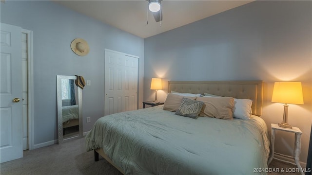 bedroom with carpet floors, baseboards, and a ceiling fan