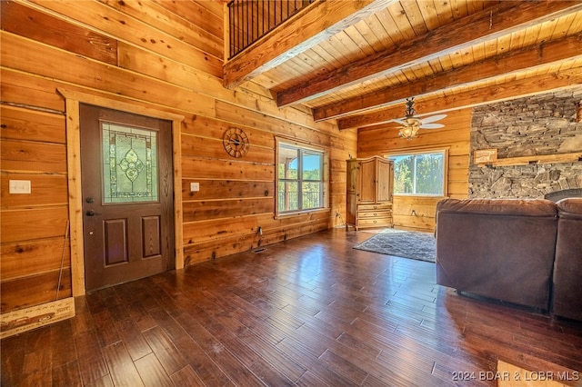 foyer featuring dark hardwood / wood-style flooring, ceiling fan, beam ceiling, wooden ceiling, and wood walls