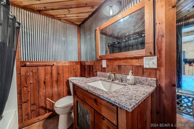 full bathroom with wooden ceiling, wood walls, toilet, vanity, and independent shower and bath