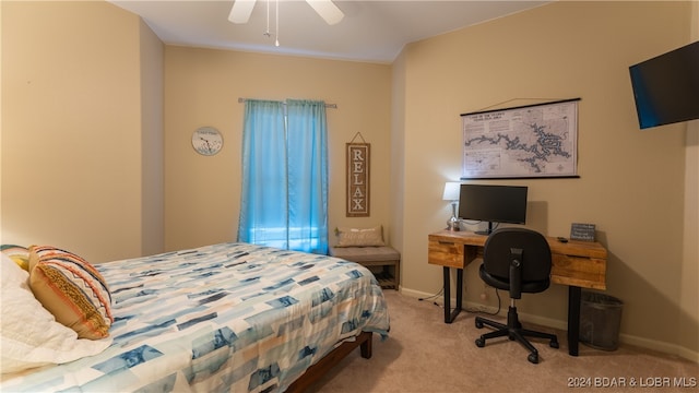 bedroom featuring light carpet and ceiling fan