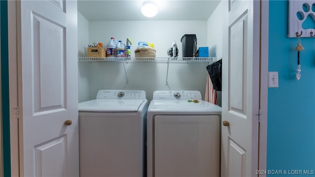 laundry room featuring washer and dryer