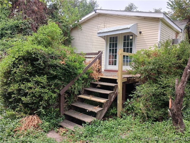 exterior space featuring a wooden deck