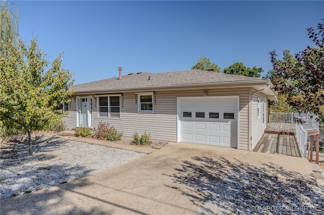 single story home with a garage