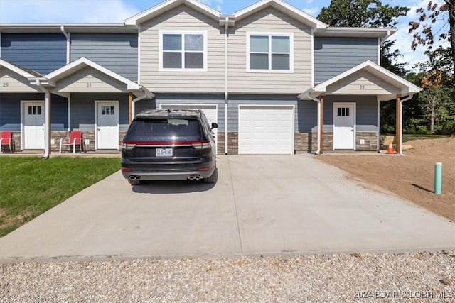 view of front of property with a garage