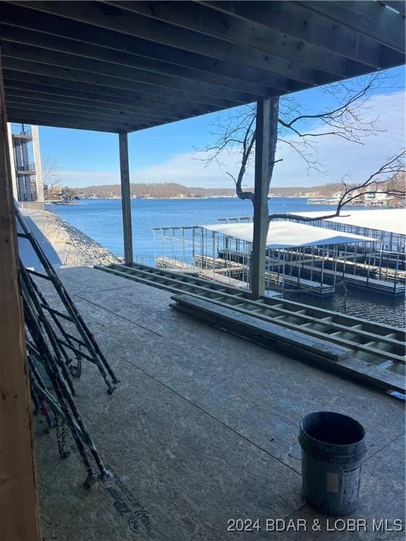 view of patio with a water view