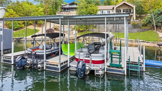 dock area with a water view