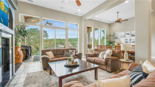 sunroom with ceiling fan