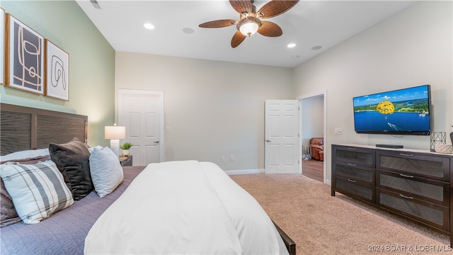 carpeted bedroom featuring ceiling fan