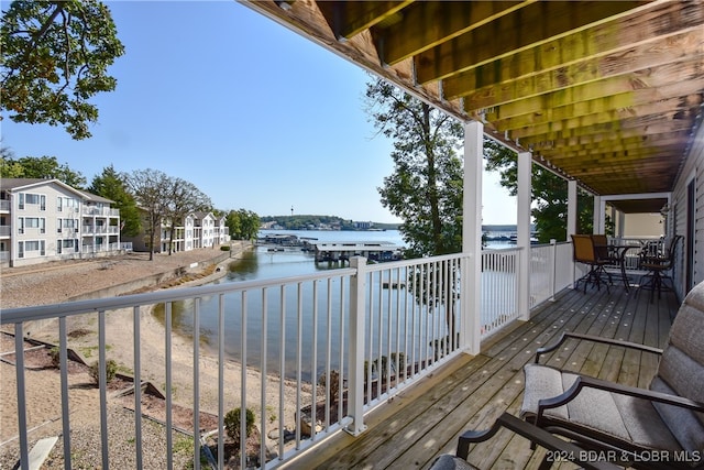 balcony featuring a water view