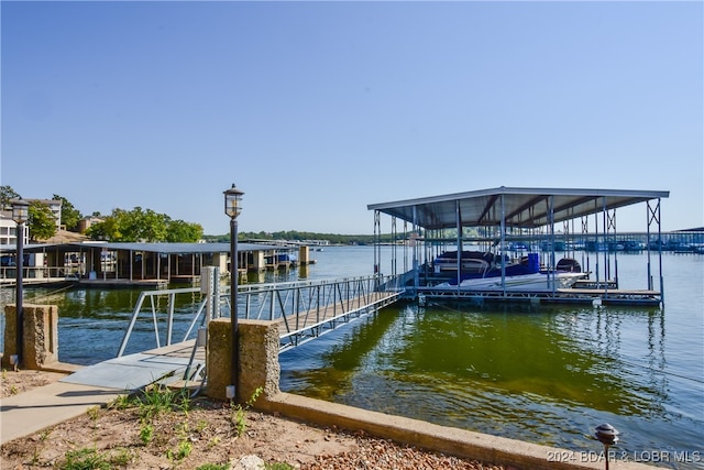 view of dock with a water view