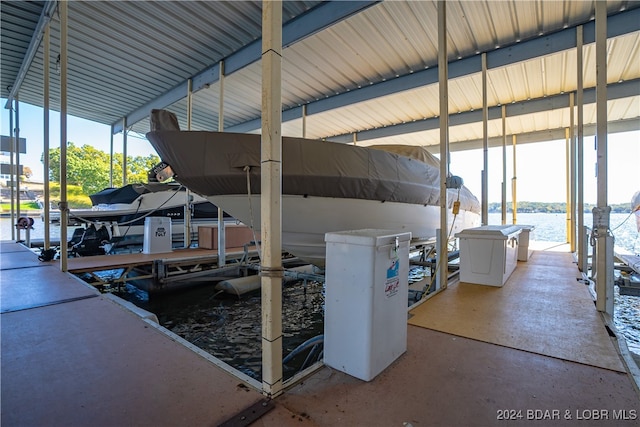 dock area with a water view