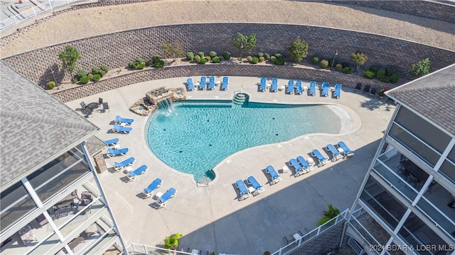 community pool with a patio