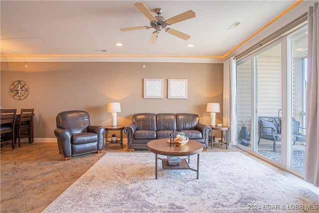 living area with ornamental molding, recessed lighting, baseboards, and a ceiling fan