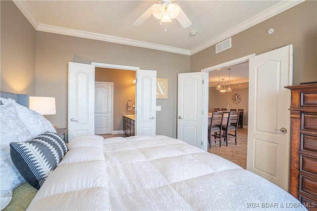 carpeted bedroom featuring ceiling fan, visible vents, connected bathroom, and ornamental molding