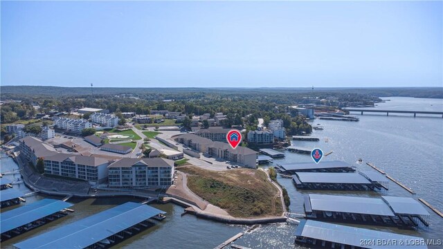 drone / aerial view with a water view