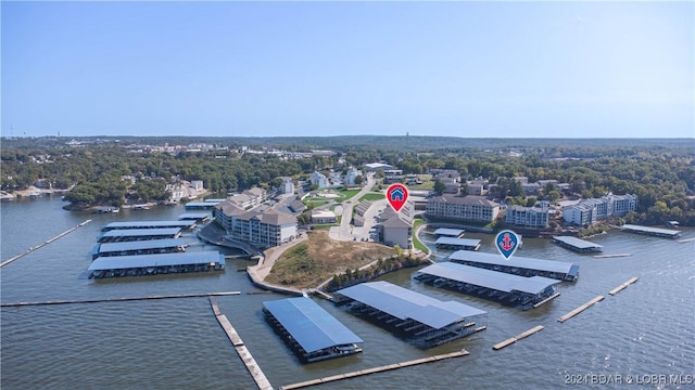 birds eye view of property featuring a water view