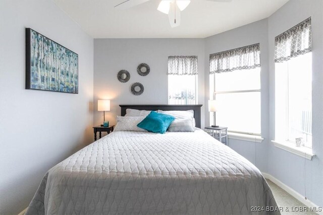 bedroom featuring carpet flooring and ceiling fan