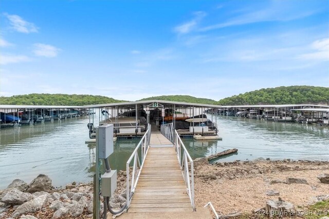 view of dock featuring a water view