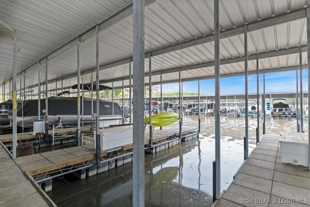 dock area featuring a water view