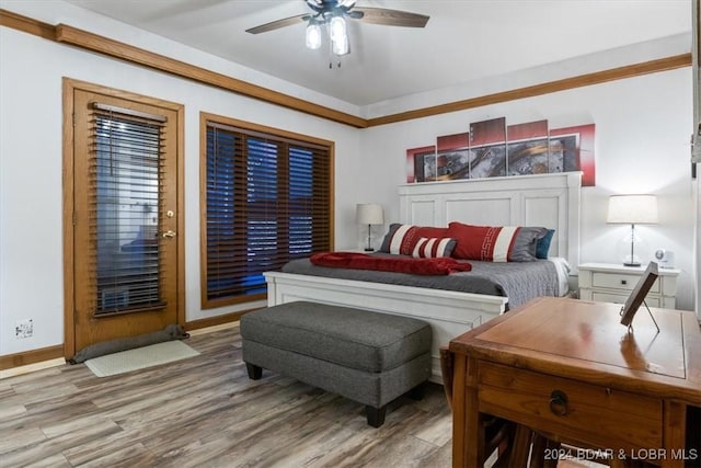 bedroom featuring wood-type flooring and ceiling fan