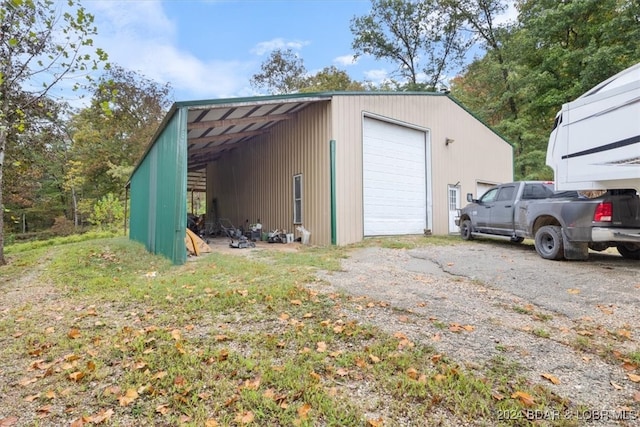 view of outbuilding featuring a garage