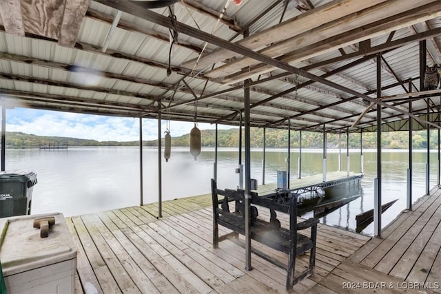 view of dock with a water view