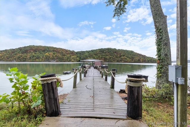 view of dock with a water view