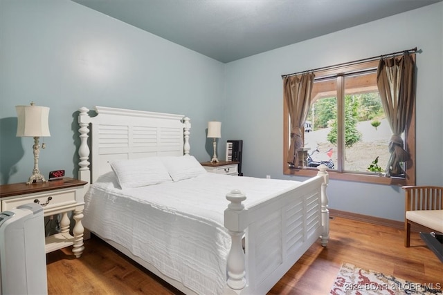 bedroom featuring hardwood / wood-style floors