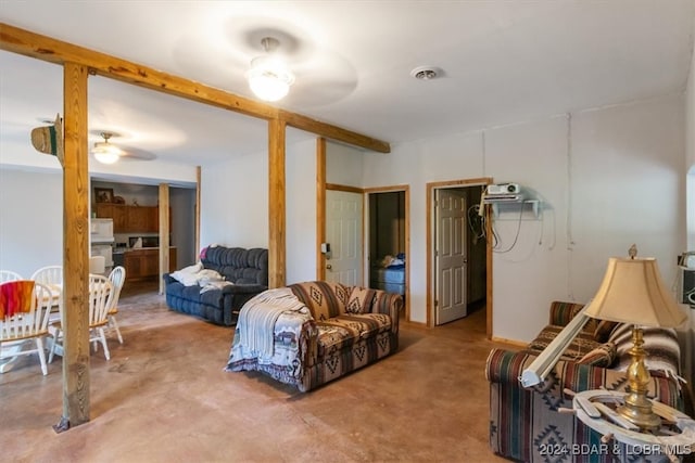 living room featuring ceiling fan and carpet flooring