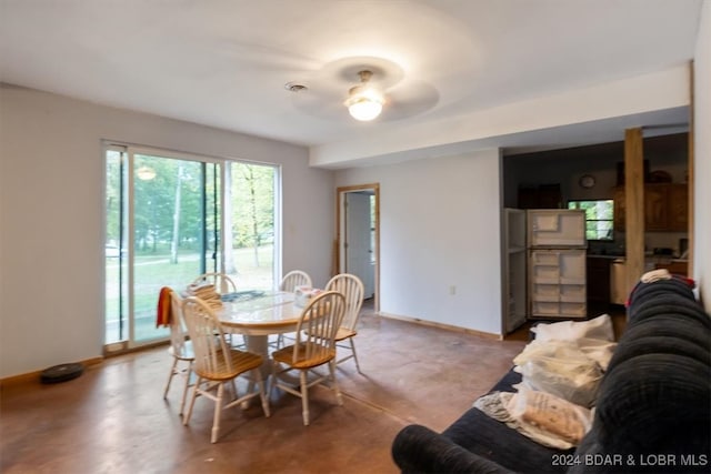 dining space featuring ceiling fan